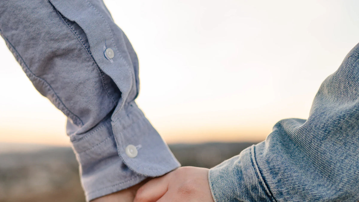 A close view of two hands held together.