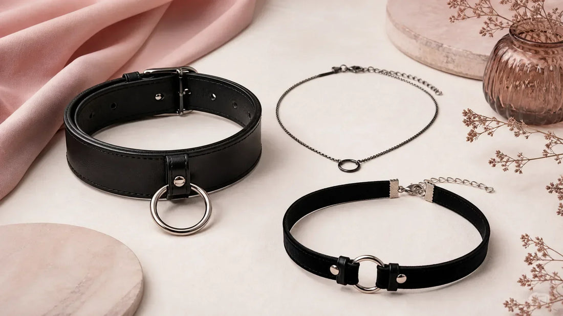 Several adult BDSM collar styles arranged as an educational comparison
