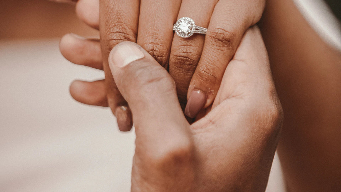 A close view of two hands held together.