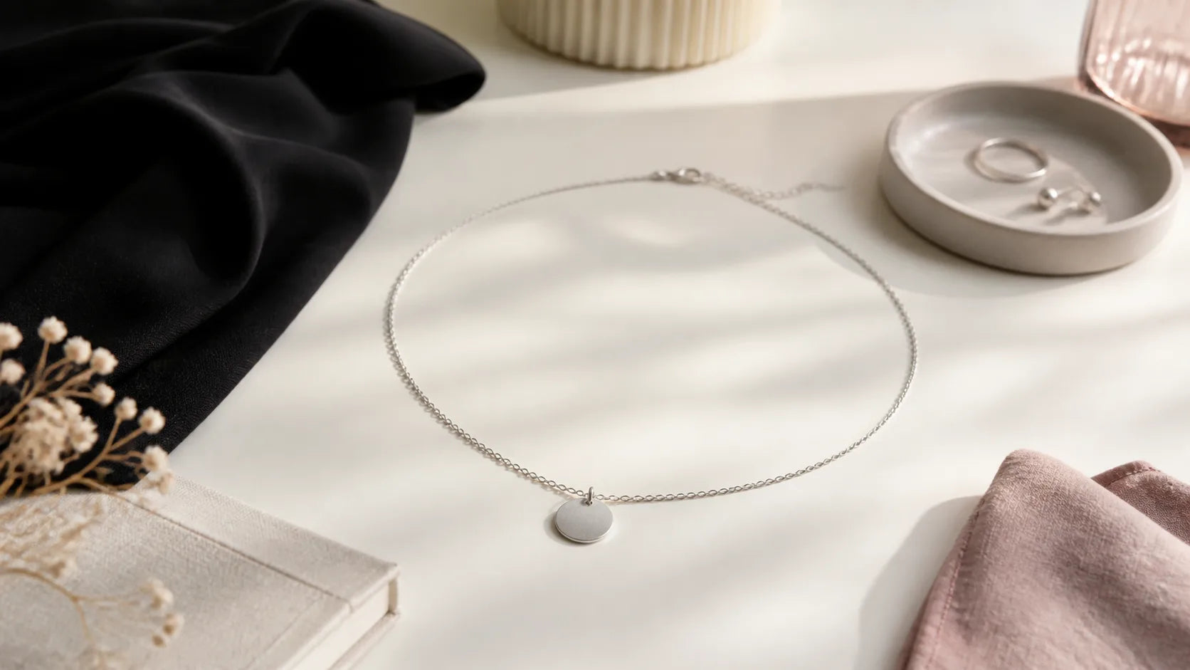 Discreet necklace-style day collar arranged with everyday accessories