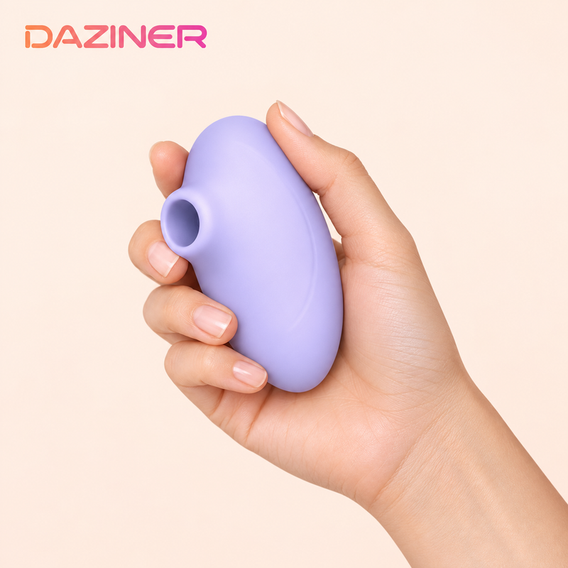 Daziner Gloria WY0735 - adult hand holding the lavender suction stimulator