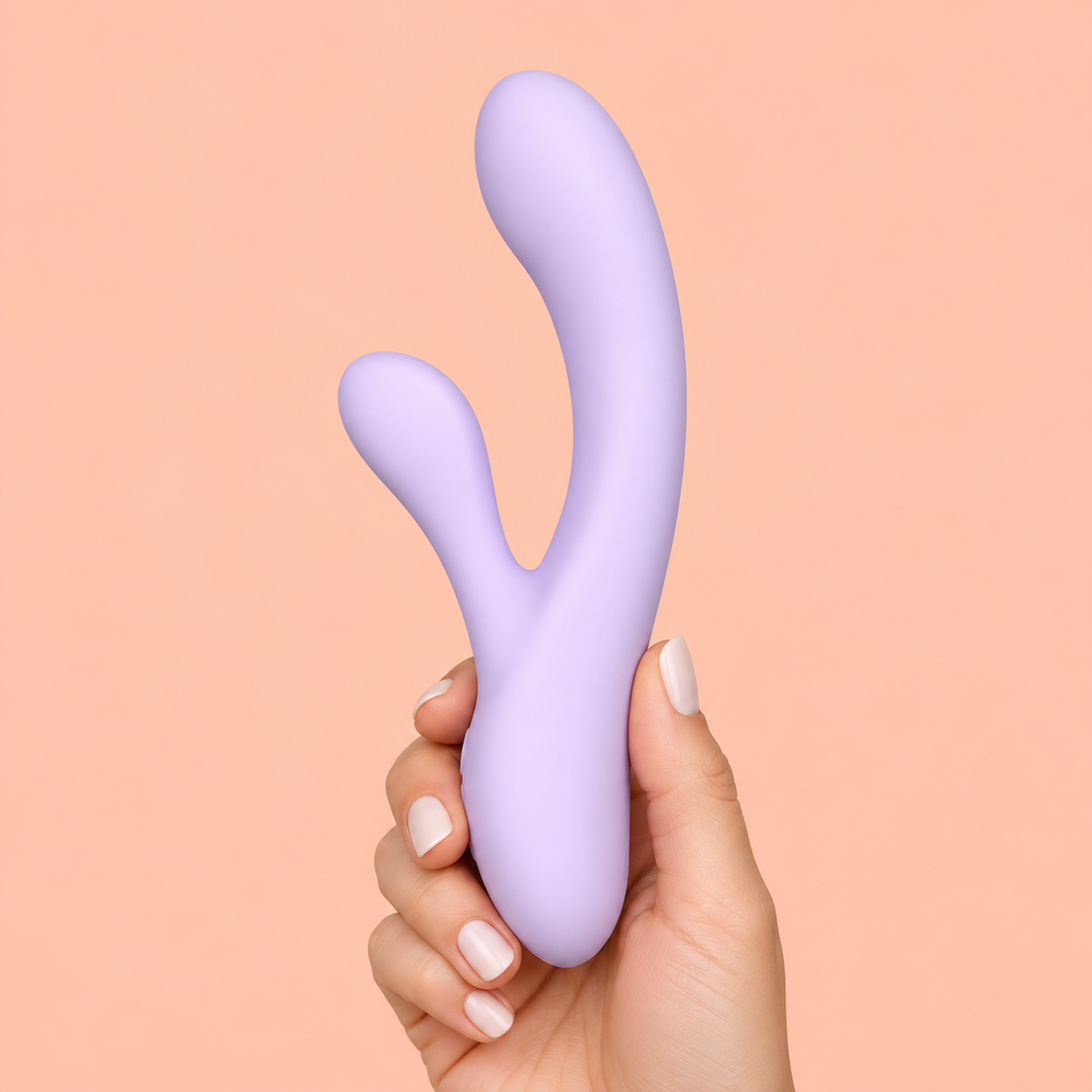 Daziner Calista WY0782 - adult hand holding the lavender dual-action vibrator