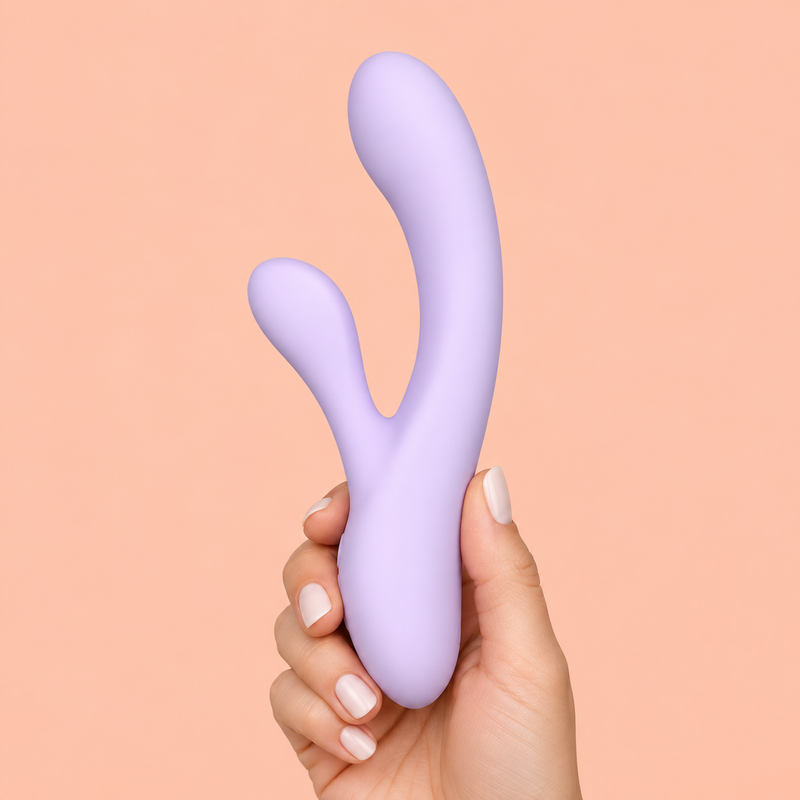 Daziner Calista WY0782 - adult hand holding the lavender dual-action vibrator